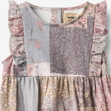 Wheat Main Spieleranzug Emmaline Romper 9618 patchwork flowers